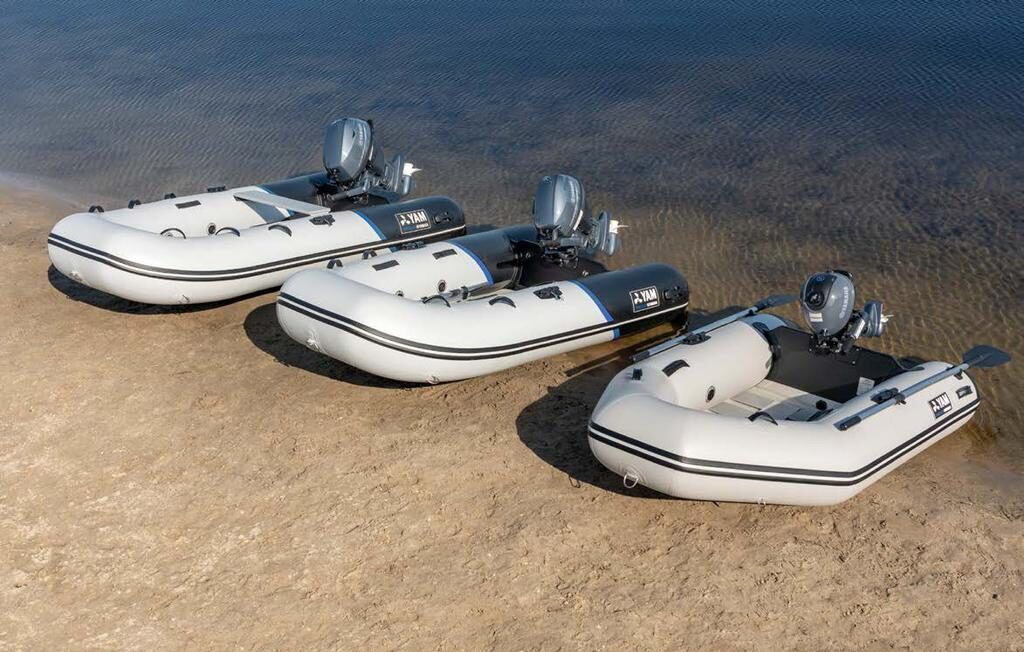 Drie boten op het water